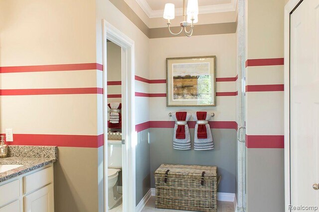 14268 Durant St, Fenton, MI 48451 - bathroom featuring ornamental molding, toilet, a chandelier, vanity, and baseboards