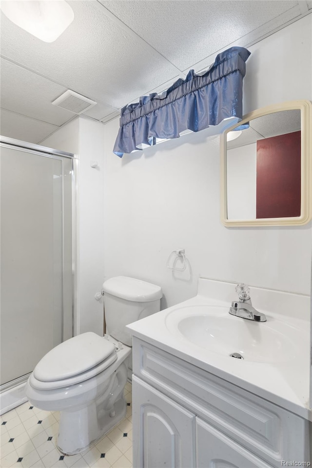 630 Symes Ave, Royal Oak, MI 48067 - bathroom with a stall shower, vanity, and toilet