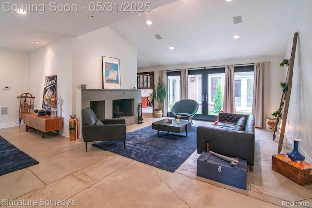3171 E Breckenridge Ln, Bloomfield Hills, MI 48301 - living area with lofted ceiling, recessed lighting, a fireplace, baseboards, and concrete floors