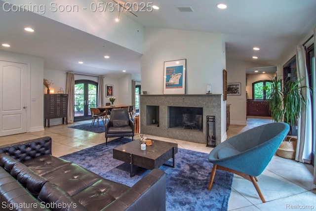 3171 E Breckenridge Ln, Bloomfield Hills, MI 48301 - tiled living room with recessed lighting, baseboards, lofted ceiling, and a high end fireplace