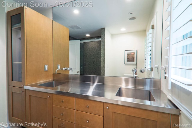 3171 E Breckenridge Ln, Bloomfield Hills, MI 48301 - full bathroom featuring double vanity, a shower stall, and recessed lighting