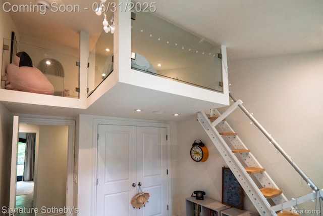 3171 E Breckenridge Ln, Bloomfield Hills, MI 48301 - stairway with recessed lighting and a towering ceiling