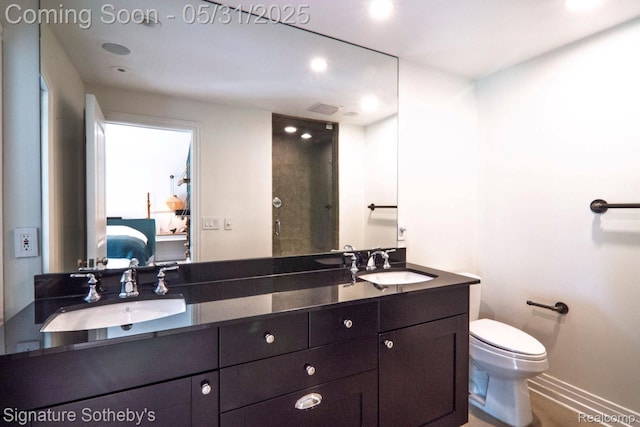 3171 E Breckenridge Ln, Bloomfield Hills, MI 48301 - bathroom featuring double vanity, toilet, a shower with door, recessed lighting, and baseboards
