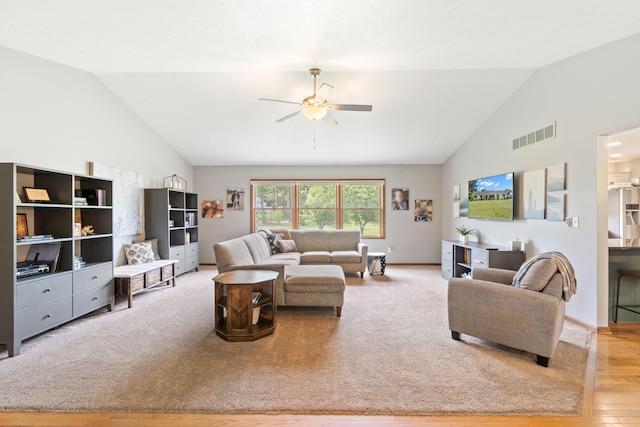 617 Ramsey Ln, Pleasant Lake, MI 49272 - living area featuring a ceiling fan, wood finished floors, high vaulted ceiling, and baseboards