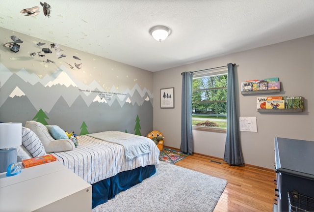 617 Ramsey Ln, Pleasant Lake, MI 49272 - bedroom featuring light wood-type flooring