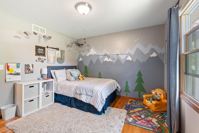 617 Ramsey Ln, Pleasant Lake, MI 49272 - bedroom featuring wood finished floors and baseboards