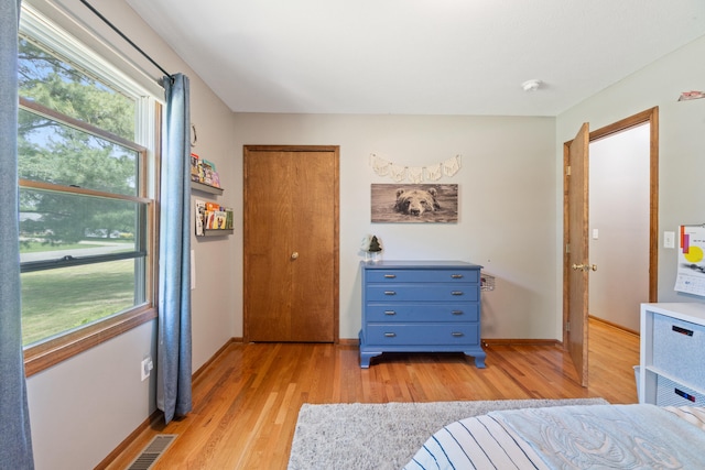 617 Ramsey Ln, Pleasant Lake, MI 49272 - bedroom with light wood-style flooring and baseboards