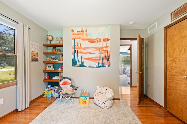 617 Ramsey Ln, Pleasant Lake, MI 49272 - recreation room featuring wood finished floors and baseboards