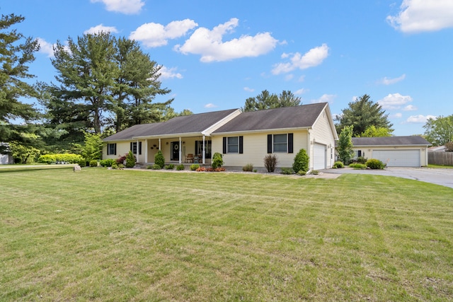 617 Ramsey Ln, Pleasant Lake, MI 49272 - ranch-style home with a porch, a garage, and a front yard