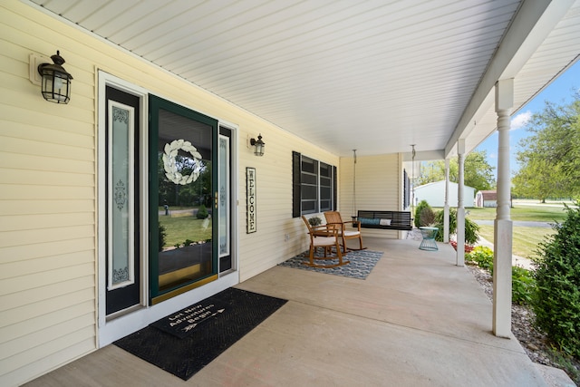 617 Ramsey Ln, Pleasant Lake, MI 49272 - doorway to property with covered porch