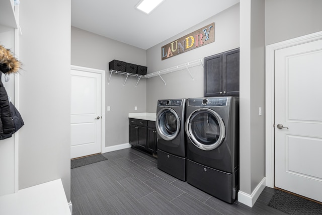 4034 Glacier Lake Ct, Dexter, MI 48130 - laundry area featuring cabinet space, separate washer and dryer, and baseboards