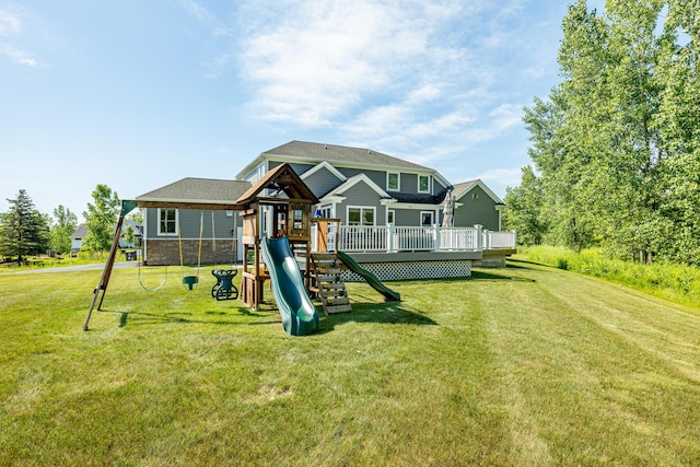 4034 Glacier Lake Ct, Dexter, MI 48130 - view of playground with a lawn and a deck