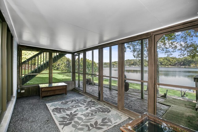 70847 Claire Dr, Union, MI 49130 - unfurnished sunroom with a water view and carpet