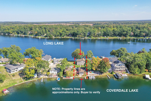 70847 Claire Dr, Union, MI 49130 - drone / aerial view of a forest and a nearby body of water