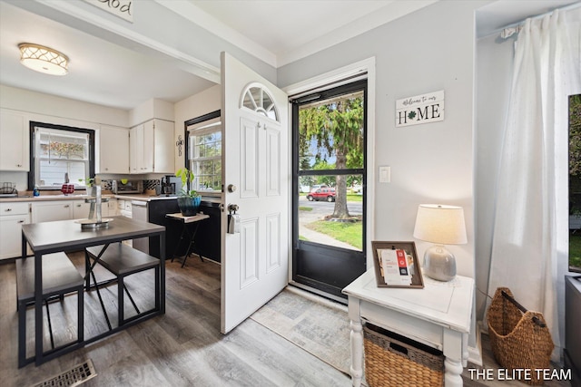 4542 Pinehurst Ave SW, Grand Rapids, MI 49548 - entrance foyer featuring light wood finished floors