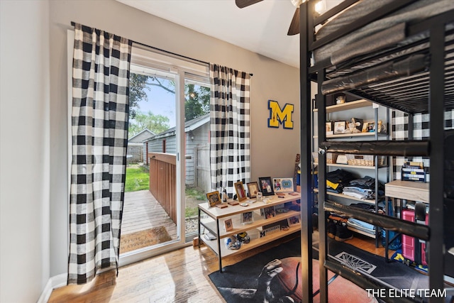 4542 Pinehurst Ave SW, Grand Rapids, MI 49548 - wine room with wood finished floors and a ceiling fan