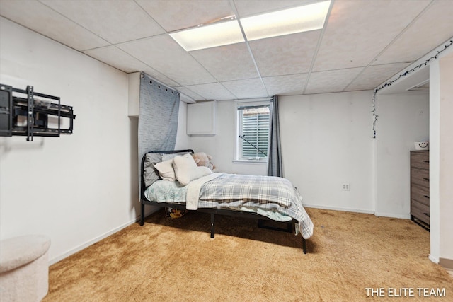 4542 Pinehurst Ave SW, Grand Rapids, MI 49548 - carpeted bedroom with a paneled ceiling and baseboards