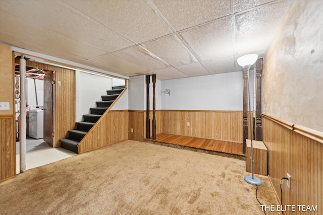 4542 Pinehurst Ave SW, Grand Rapids, MI 49548 - finished basement with washer / dryer, a wainscoted wall, stairs, wood walls, and carpet