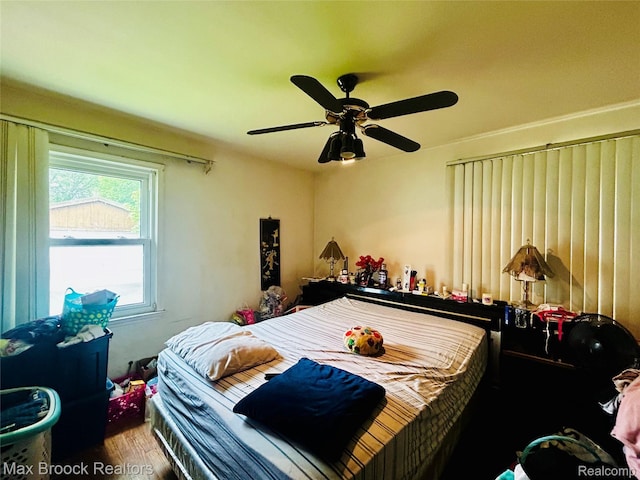 20236 Spencer St, Detroit, MI 48234 - bedroom with wood finished floors and a ceiling fan