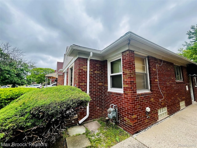 20236 Spencer St, Detroit, MI 48234 - view of side of home featuring brick siding