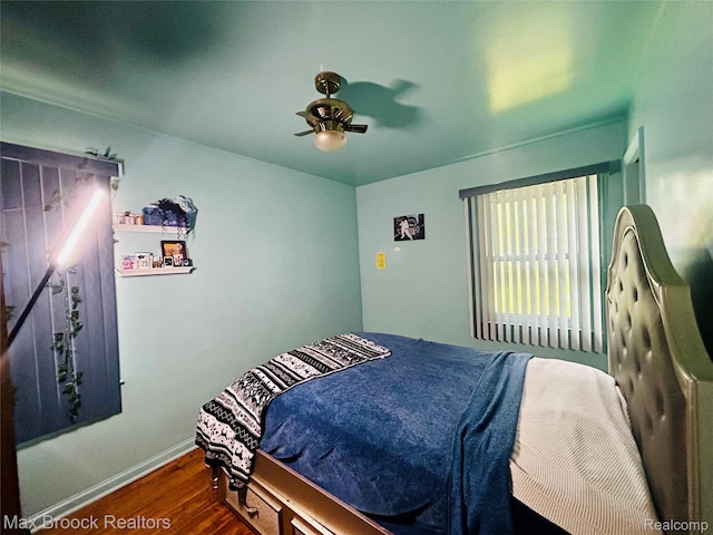 20236 Spencer St, Detroit, MI 48234 - bedroom with wood finished floors, baseboards, and ceiling fan
