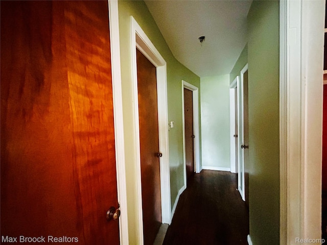 20236 Spencer St, Detroit, MI 48234 - corridor with dark wood-type flooring and baseboards
