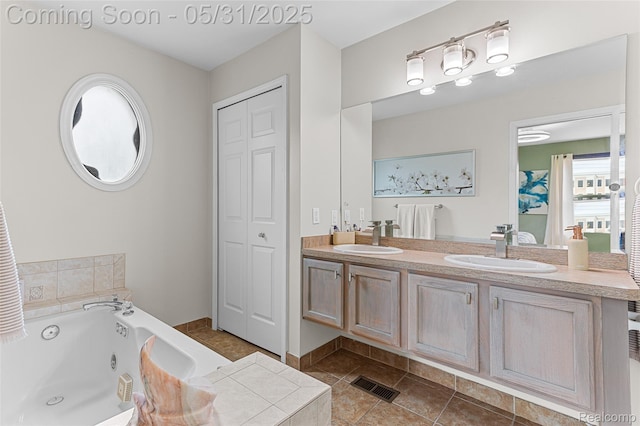 21106 Collingham Ave, Farmington Hills, MI 48336 - full bathroom with tile patterned flooring, double vanity, a jetted tub, and a closet