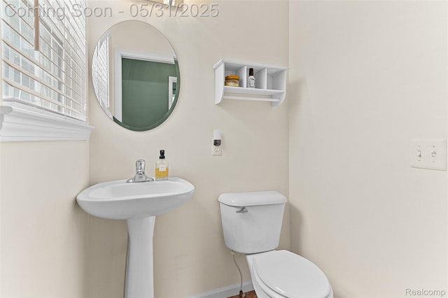 21106 Collingham Ave, Farmington Hills, MI 48336 - bathroom featuring toilet and baseboards