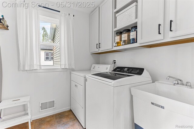 21106 Collingham Ave, Farmington Hills, MI 48336 - laundry room featuring cabinet space, washing machine and clothes dryer, and baseboards