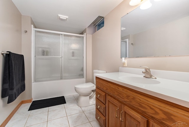3677 W White Trillium Dr, Saginaw, MI 48603 - full bath featuring vanity, toilet, combined bath / shower with glass door, and tile patterned flooring