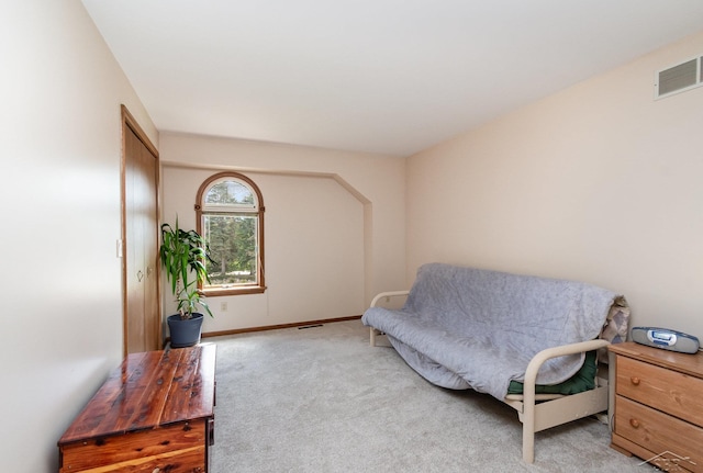 3677 W White Trillium Dr, Saginaw, MI 48603 - sitting room featuring light carpet and baseboards