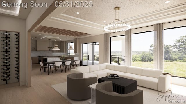 2717 Turtle Shores Dr, Bloomfield Hills, MI 48302 - living room featuring a tray ceiling, healthy amount of natural light, light wood-style flooring, and recessed lighting