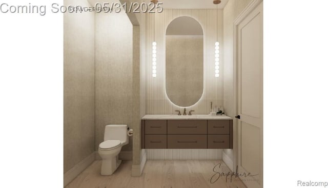 2717 Turtle Shores Dr, Bloomfield Hills, MI 48302 - bathroom with vanity, toilet, and wood finished floors
