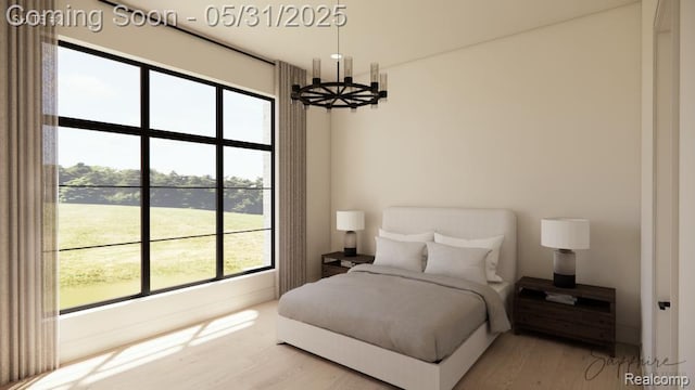 2717 Turtle Shores Dr, Bloomfield Hills, MI 48302 - bedroom with a chandelier and wood finished floors