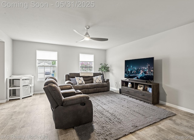 342 Lotz Ct, Wayland, MI 49348 - living room featuring wood finished floors, a ceiling fan, and baseboards