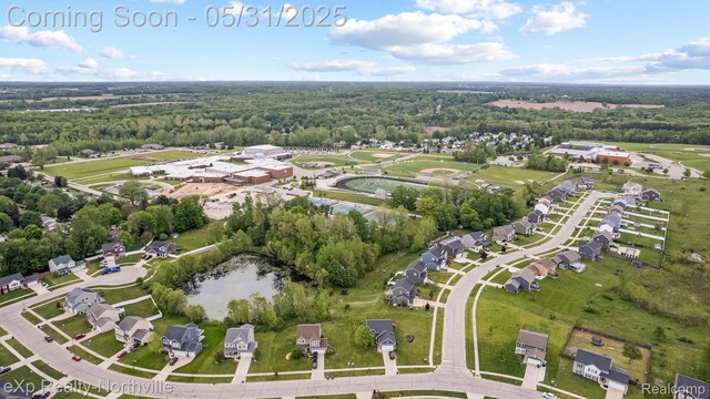 342 Lotz Ct, Wayland, MI 49348 - aerial overview of property's location with a heavily wooded area and nearby suburban area