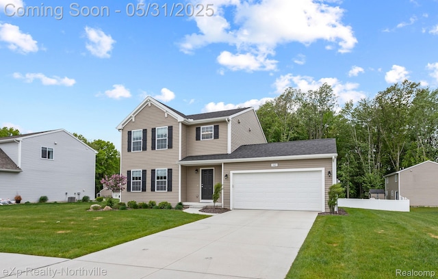 342 Lotz Ct, Wayland, MI 49348 - traditional home with a garage, driveway, and a front lawn