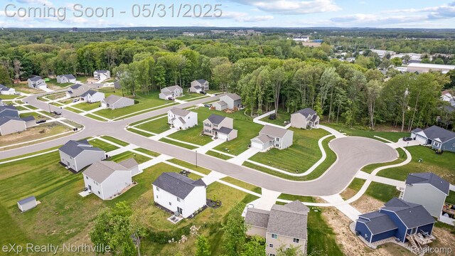 342 Lotz Ct, Wayland, MI 49348 - aerial overview of property's location with nearby suburban area and a heavily wooded area