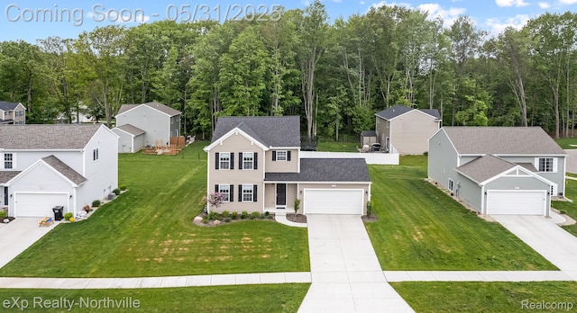 342 Lotz Ct, Wayland, MI 49348 - view of front of house with a front lawn, concrete driveway, and roof with shingles