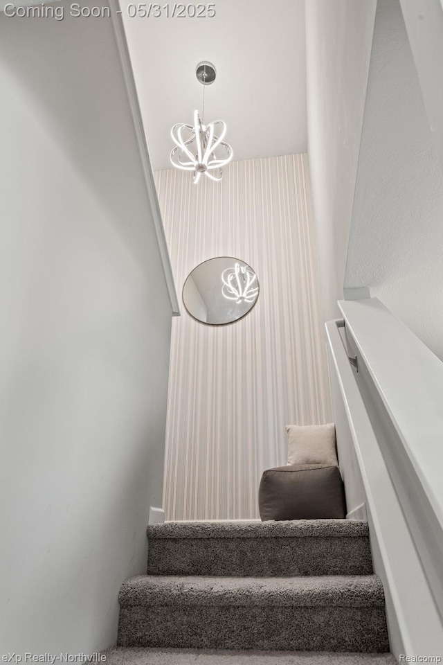 342 Lotz Ct, Wayland, MI 49348 - stairs with a chandelier