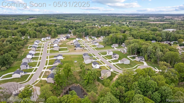 342 Lotz Ct, Wayland, MI 49348 - aerial overview of property's location with a heavily wooded area