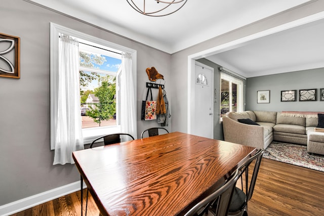 3822 Polk St, Dearborn, MI 48124 - dining space with dark wood-style flooring, plenty of natural light, and baseboards