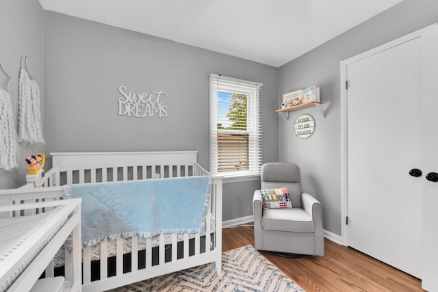 3822 Polk St, Dearborn, MI 48124 - bedroom featuring wood finished floors and baseboards