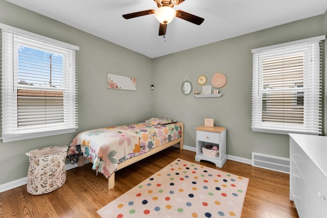3822 Polk St, Dearborn, MI 48124 - bedroom featuring baseboards, wood finished floors, and ceiling fan