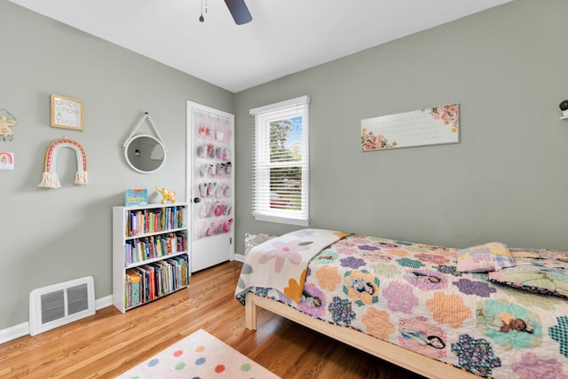 3822 Polk St, Dearborn, MI 48124 - bedroom featuring baseboards, wood finished floors, and a ceiling fan