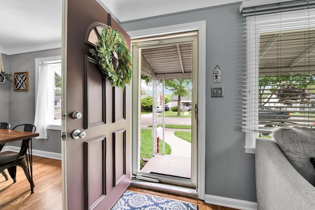 3822 Polk St, Dearborn, MI 48124 - entrance foyer with baseboards, healthy amount of natural light, and light wood finished floors