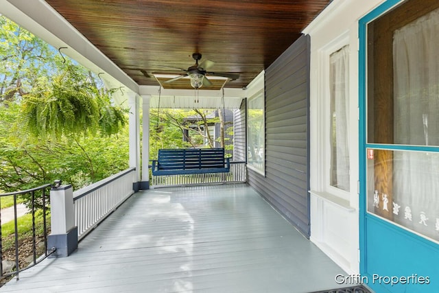 331 Carlton Ave SE, Grand Rapids, MI 49506 - wooden porch featuring ceiling fan