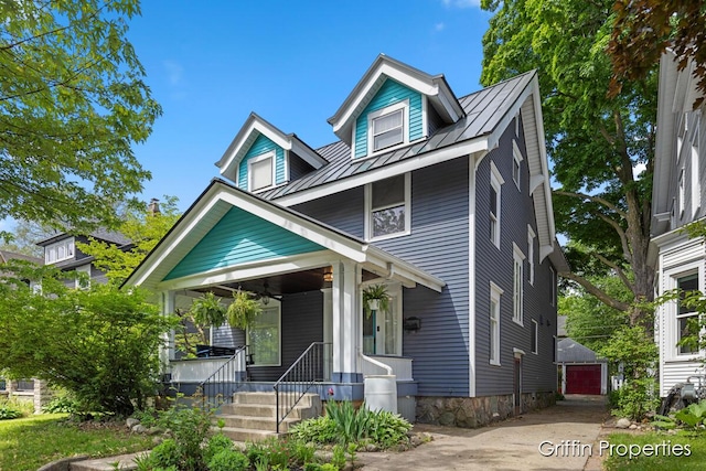 331 Carlton Ave SE, Grand Rapids, MI 49506 - american foursquare style home with covered porch, metal roof, a standing seam roof, and a detached garage