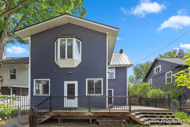 331 Carlton Ave SE, Grand Rapids, MI 49506 - rear view of house with a deck and stairway