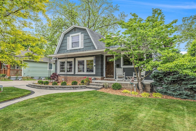 403 N Helen Ave, Rochester, MI 48307 - view of front of property featuring a porch, a front yard, a gambrel roof, and roof with shingles